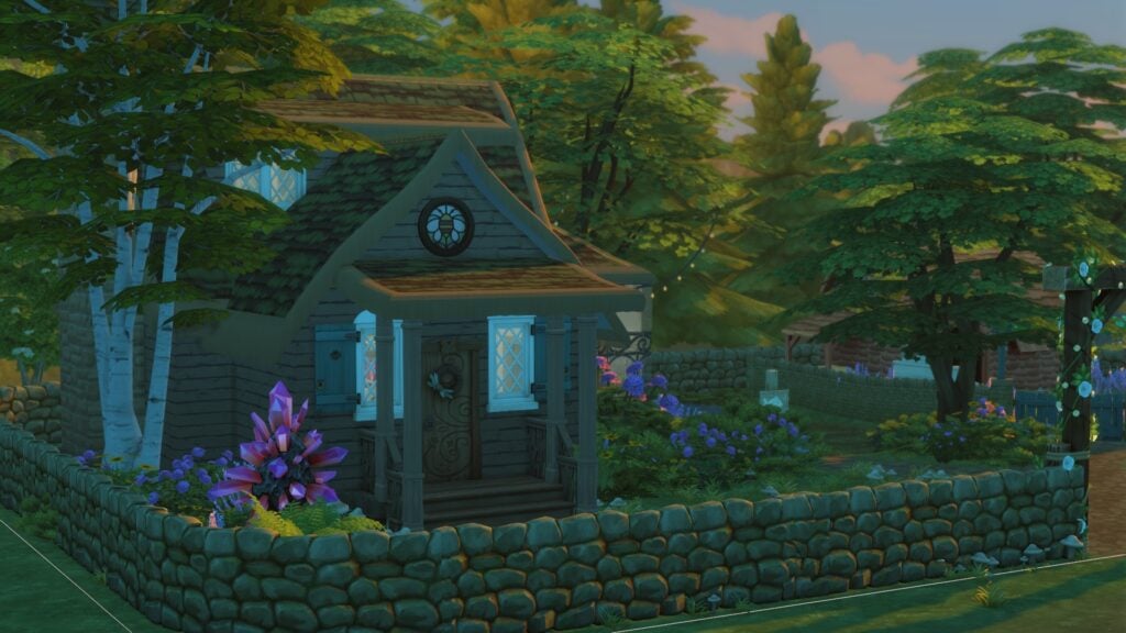 The Sims 4 Glass Walls Build Tips: Through the Simming Glass 14 Exterior of cottage with covered front porch surrounded by stone wall