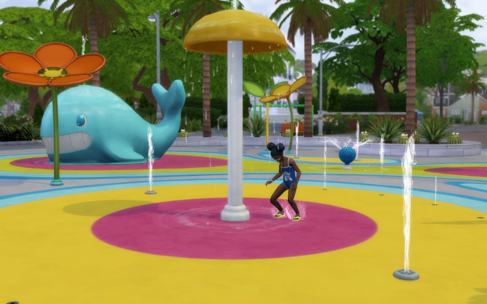 Sim splashes at the splash park in Growing Together