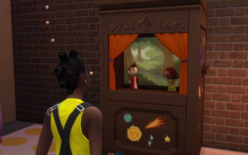 Sim watching a puppet show