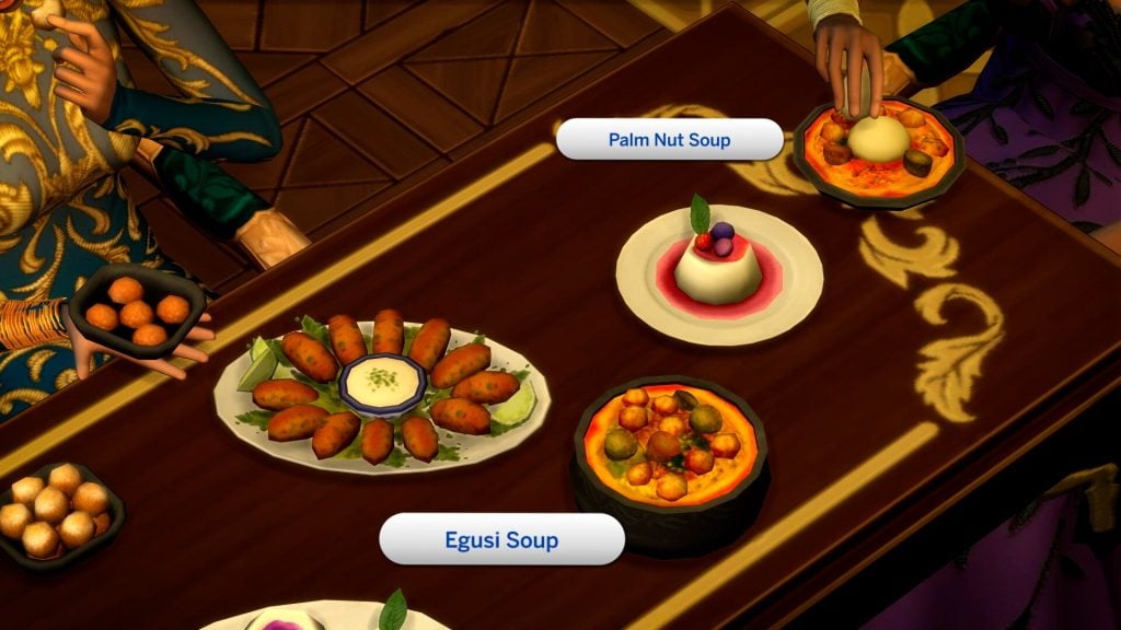 Close-up of a dining table with traditional dishes labeled Palm Nut Soup and Egusi Soup, alongside appetizers and dessert.