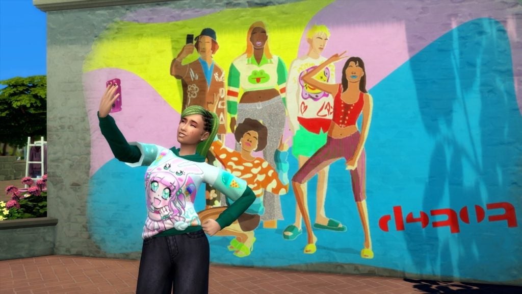 In-game screenshot of a Sim taking a selfie of herself in front of a mural on a wall. The mural has various Sims all posing next to each other.