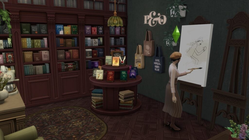 The Sims 4 Quiet Corner CC Review: A Cozy Bookshop Collection You'll Need 74 Sims 4 Quiet Corner CC cozy bookstore interior with modular bookshelves, round book display, and sim painting scene