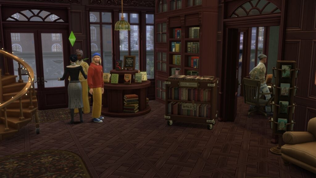 The Sims 4 Quiet Corner CC Review: A Cozy Bookshop Collection You'll Need 2 Sims 4 Quiet Corner CC bookstore interior with detailed shelves, book cart, and sims browsing in a cozy shop build