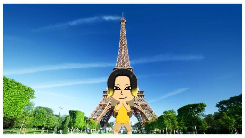 A Mii stands in front of the Eiffel tower. 