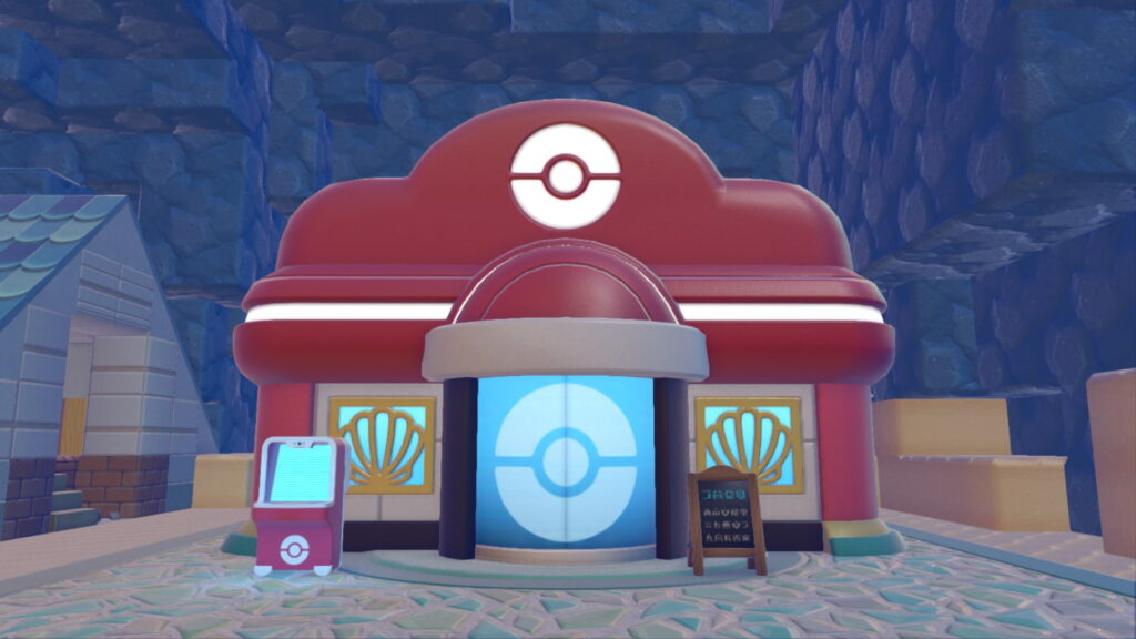 The Bubbly Basin Pokémon center, which has special shell-designs in its windows. 
